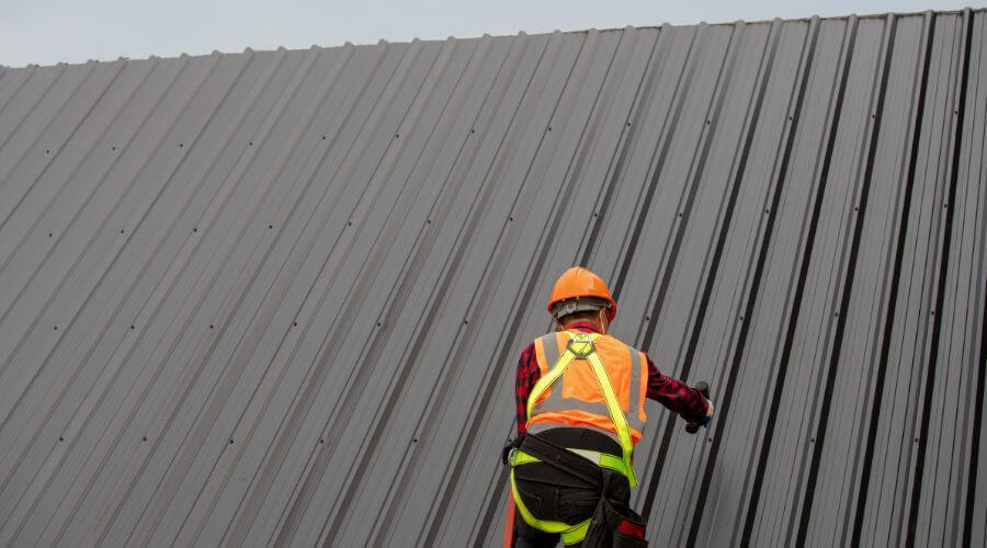Professional metal roof installation services in Carlisle, IA